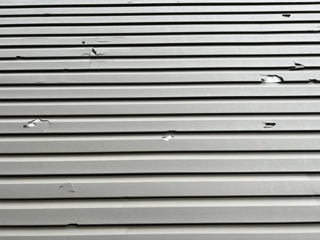 broken vinyl siding
