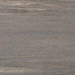 A textured surface resembling weathered wood with horizontal streaks in shades of gray, brown, and blue, giving it a rustic and natural appearance.