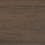 Close-up of a dark brown wood texture with visible grain patterns and subtle variations in color, showing a natural and rustic appearance.