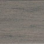 Close-up of a textured surface resembling weathered wood with horizontal grain lines in shades of gray and green, giving a rustic and natural appearance.