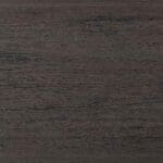 Close-up of a dark brown wooden surface with visible grain patterns and subtle texture variations. The wood has a slightly weathered appearance with natural horizontal lines and grooves.