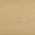 Light-colored wooden surface with a subtle, horizontal grain pattern and a smooth texture. The wood appears to be evenly finished with a natural beige tone.