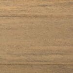 Light brown wooden surface with subtle horizontal grain patterns and slight color variations, giving a natural and textured appearance.