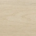 Light-colored wooden surface with a smooth texture and subtle, natural grain patterns running horizontally across the image.