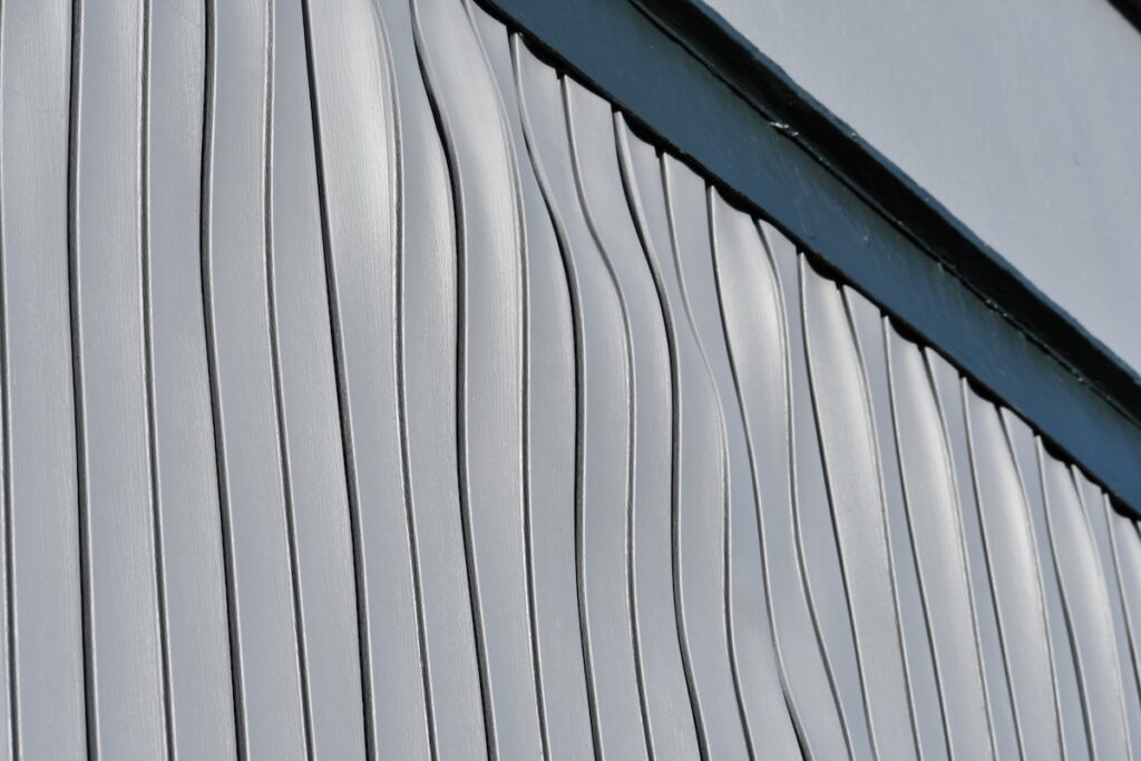 warped, damaged siding