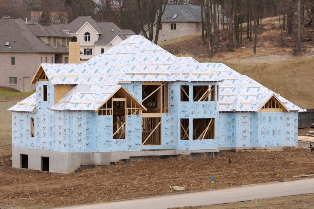 A large two-story house under construction