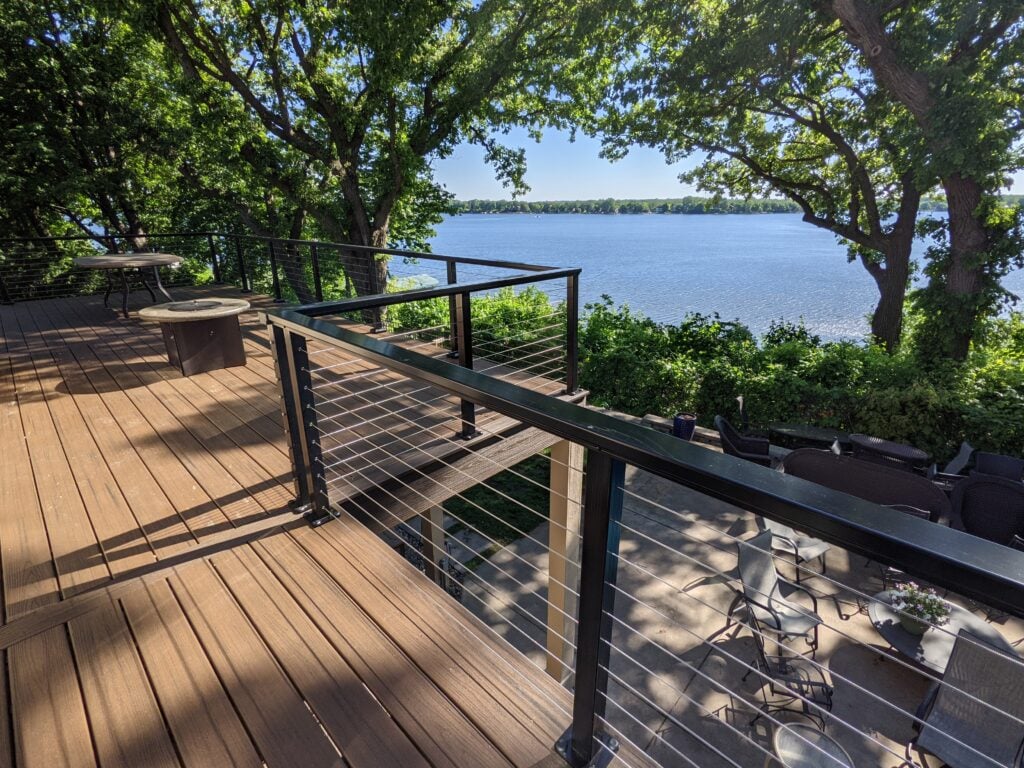 Cable railing Twin Cities — open sightline aluminum cable railing on raised composite deck